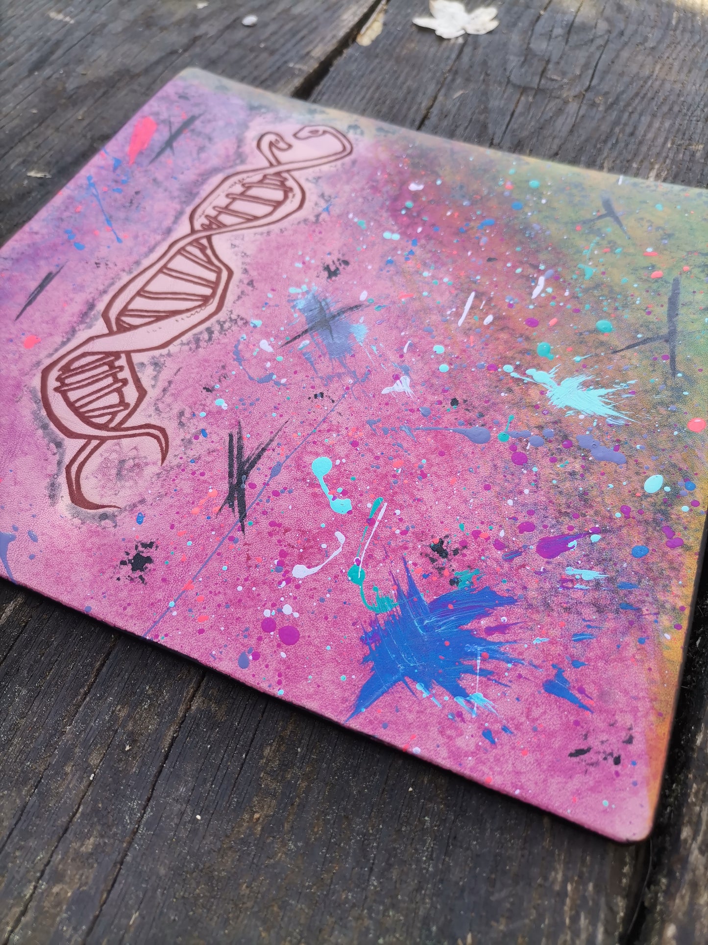Leather Moodmat with pink marbling and DNA snake engraving