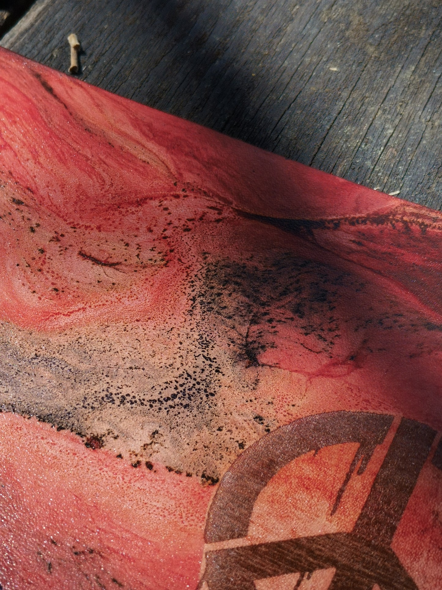 Leather Moodmat with red marbling and Peace engraving