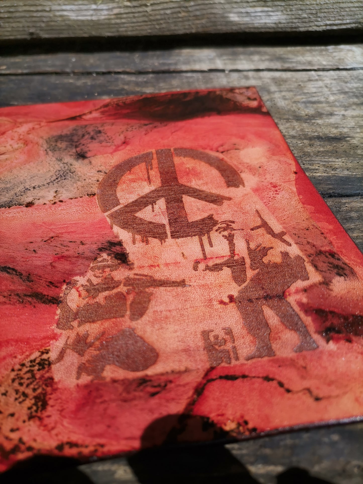 Leather Moodmat with red marbling and Peace engraving